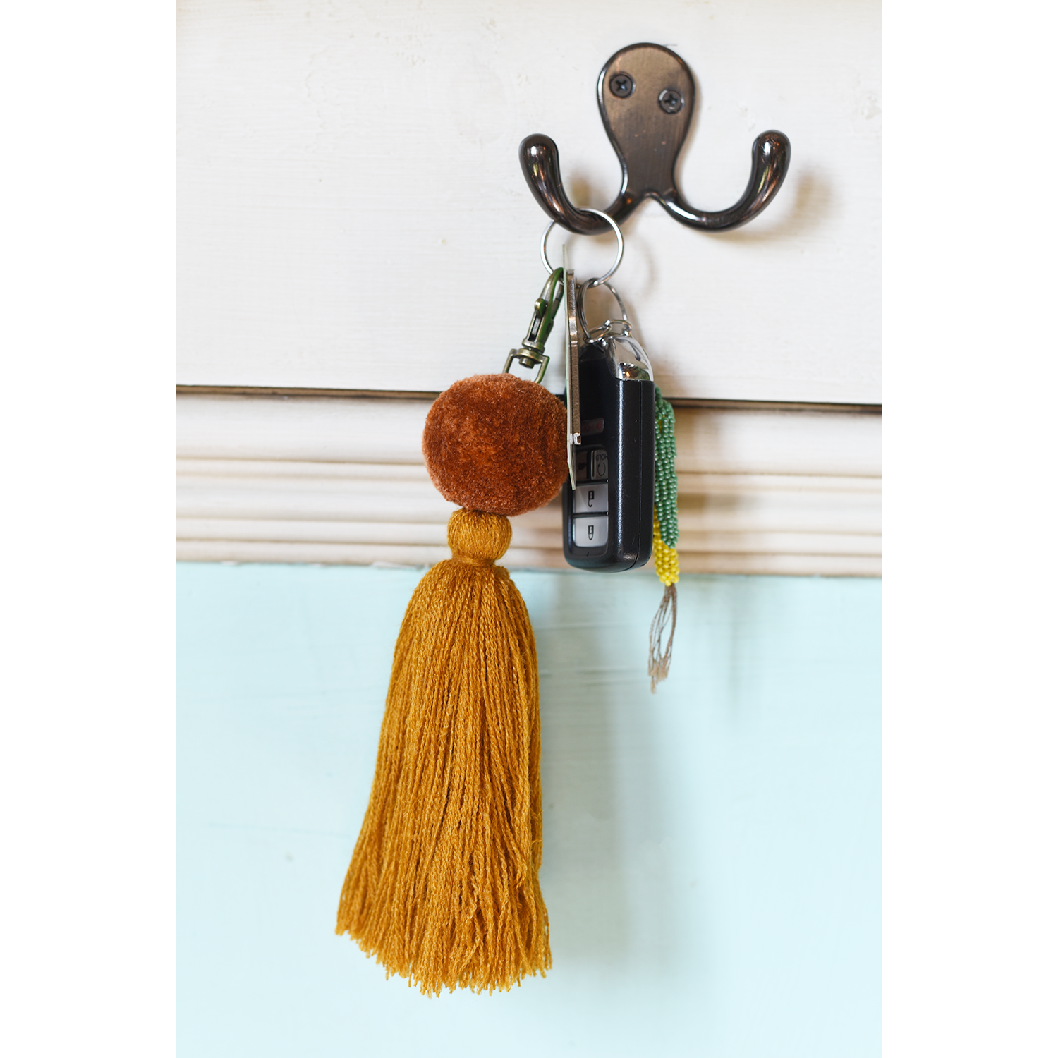 Pom Tassel Keychain in Burnt Orange