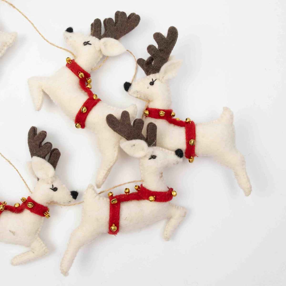 Santa with Sleigh and 7 White Reindeer Garland
